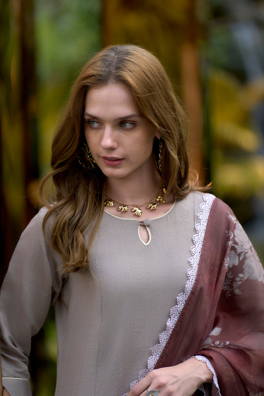 beautifully designed kurta set that seamlessly combines tradition with modern elegance.