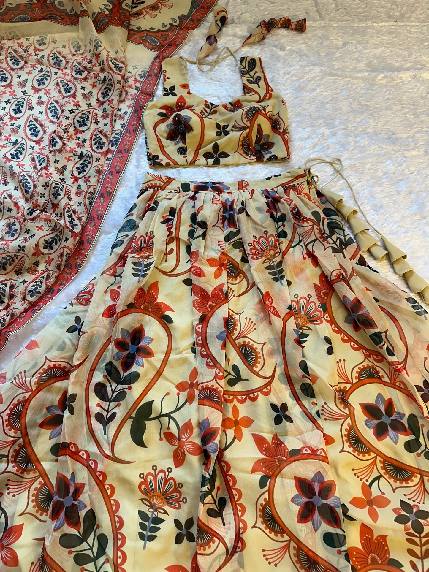 Outstanding Beige Color Floral Printed Lehenga Choli