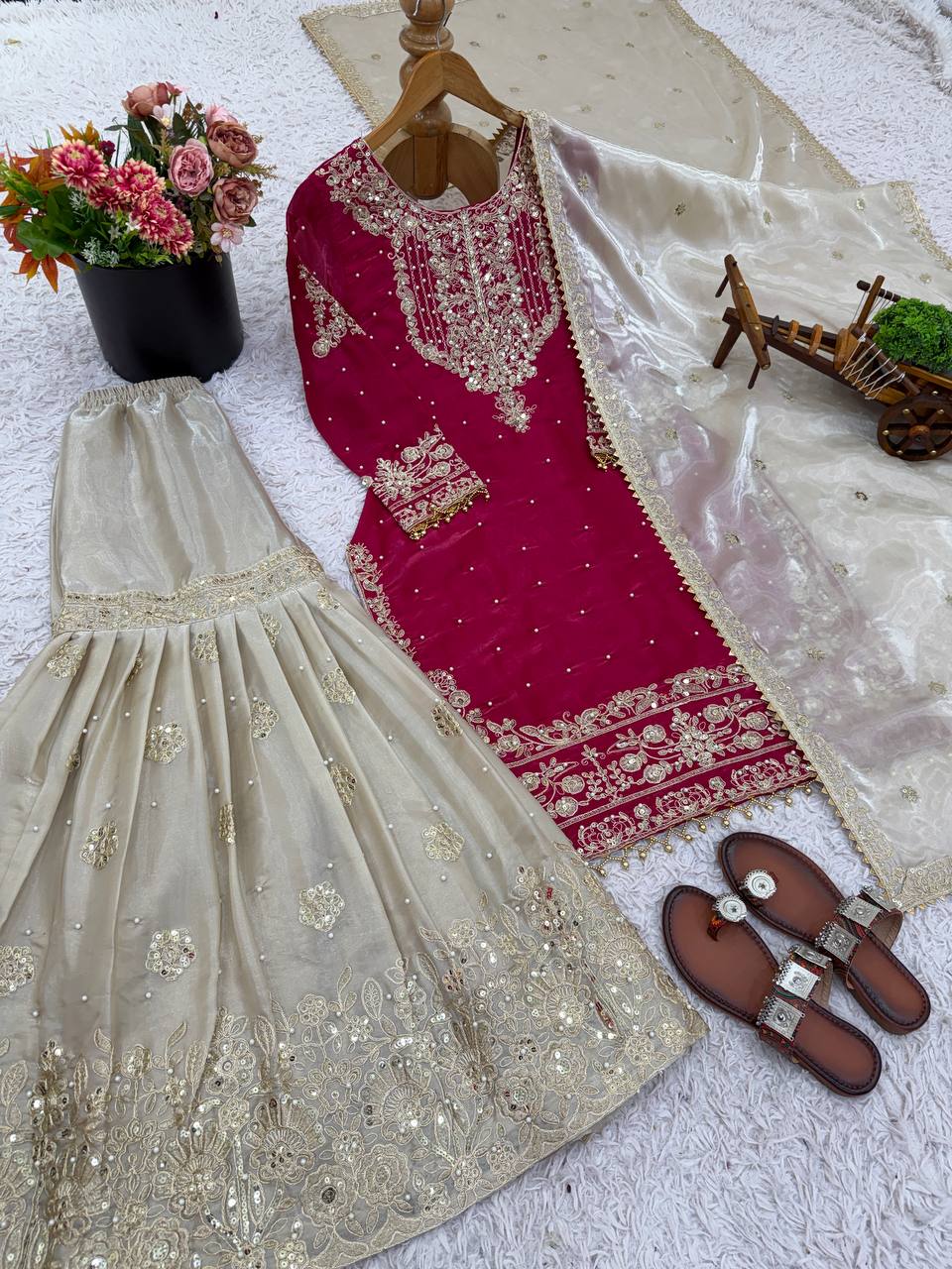 Festive Wear Pink Color Embroidered Top With Palazzo Suit