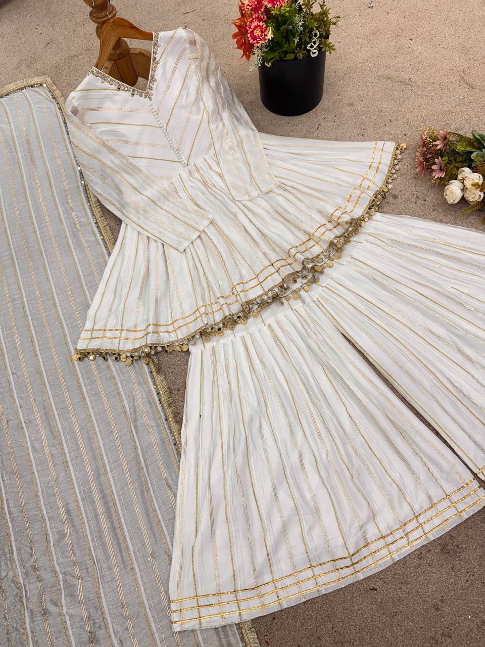 Arti Chauhan's Off White Color Mirror With Handwork Designer Sharara Suit