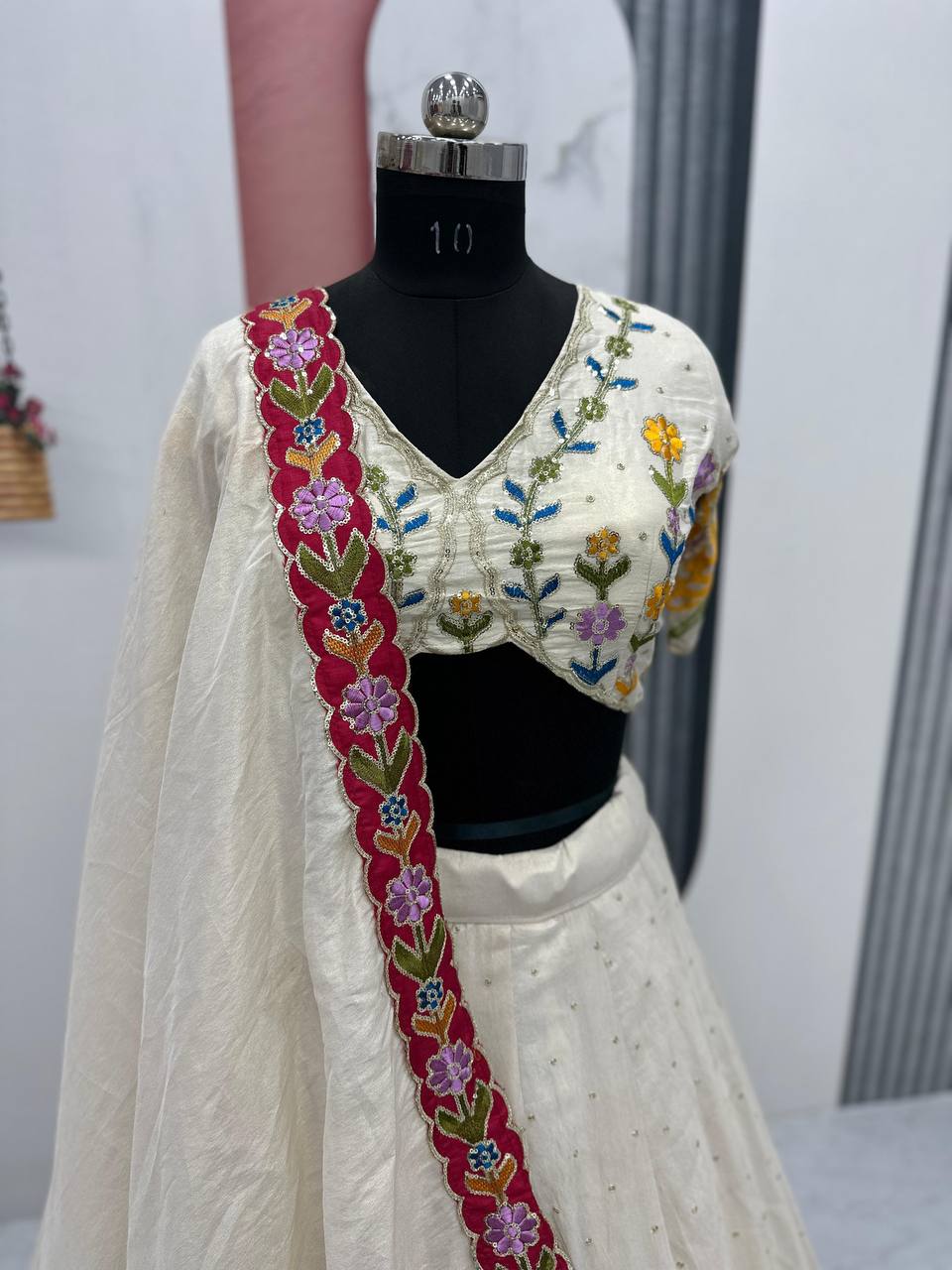 Ceremony Wear Cream Color Tissue Simmer Silk And Embroidery Sequence Work Lehenga Choli