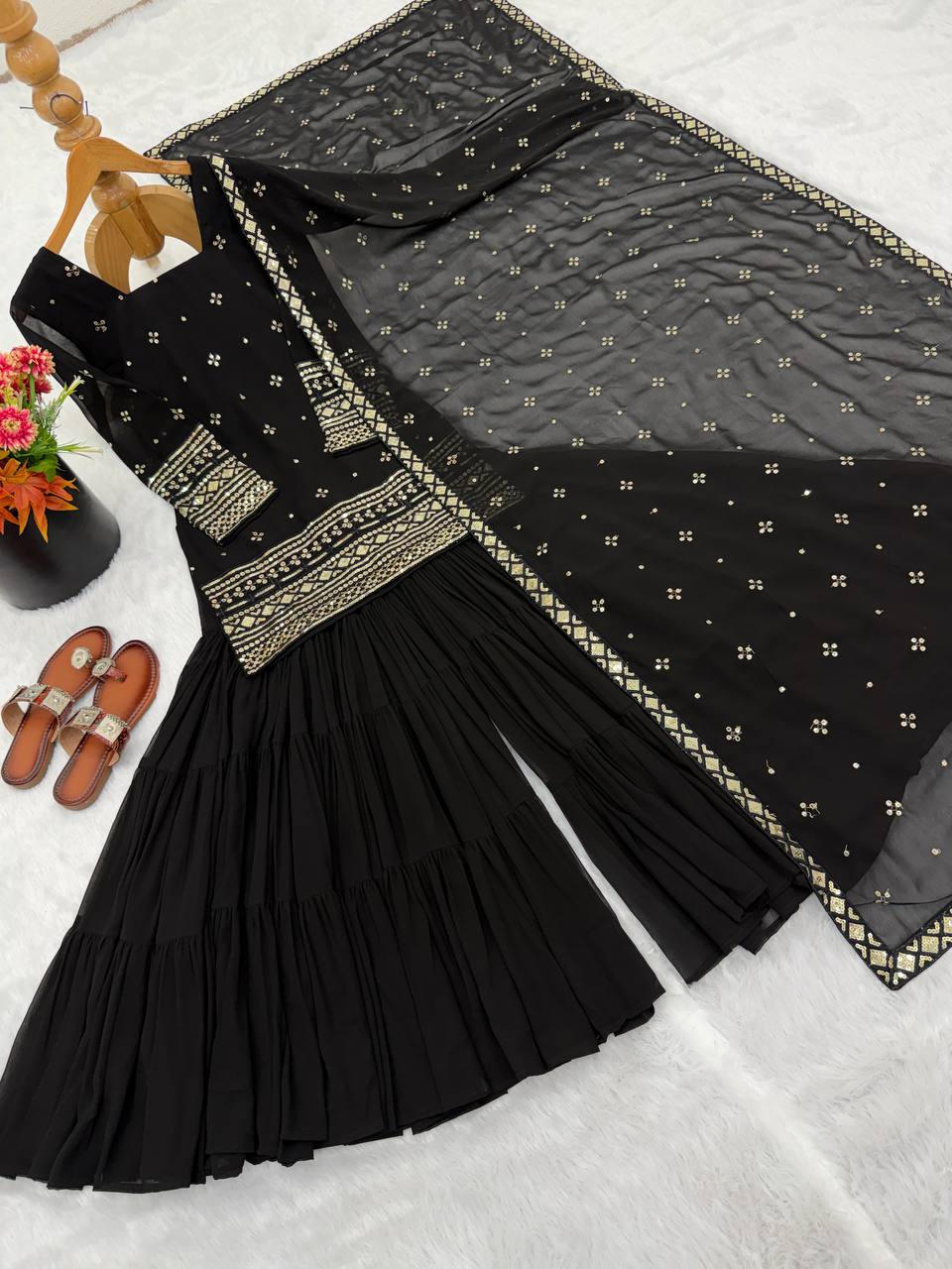 Arti Chauhan Black Color Georgette Top With Ruffle Sharara And Dupatta Set