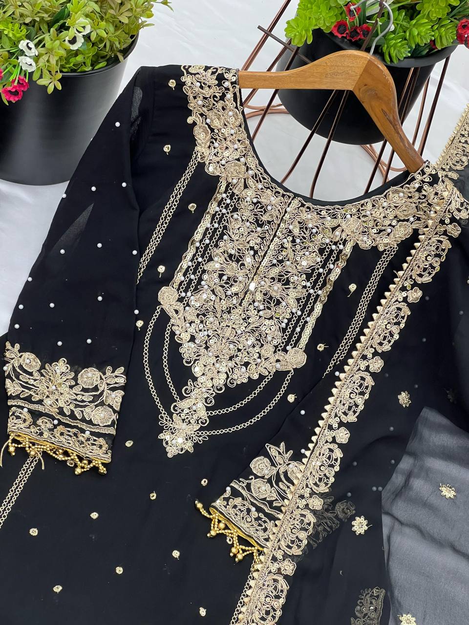 Party Wear Black Color Rivet Moti Work Georgette Sharara Suit