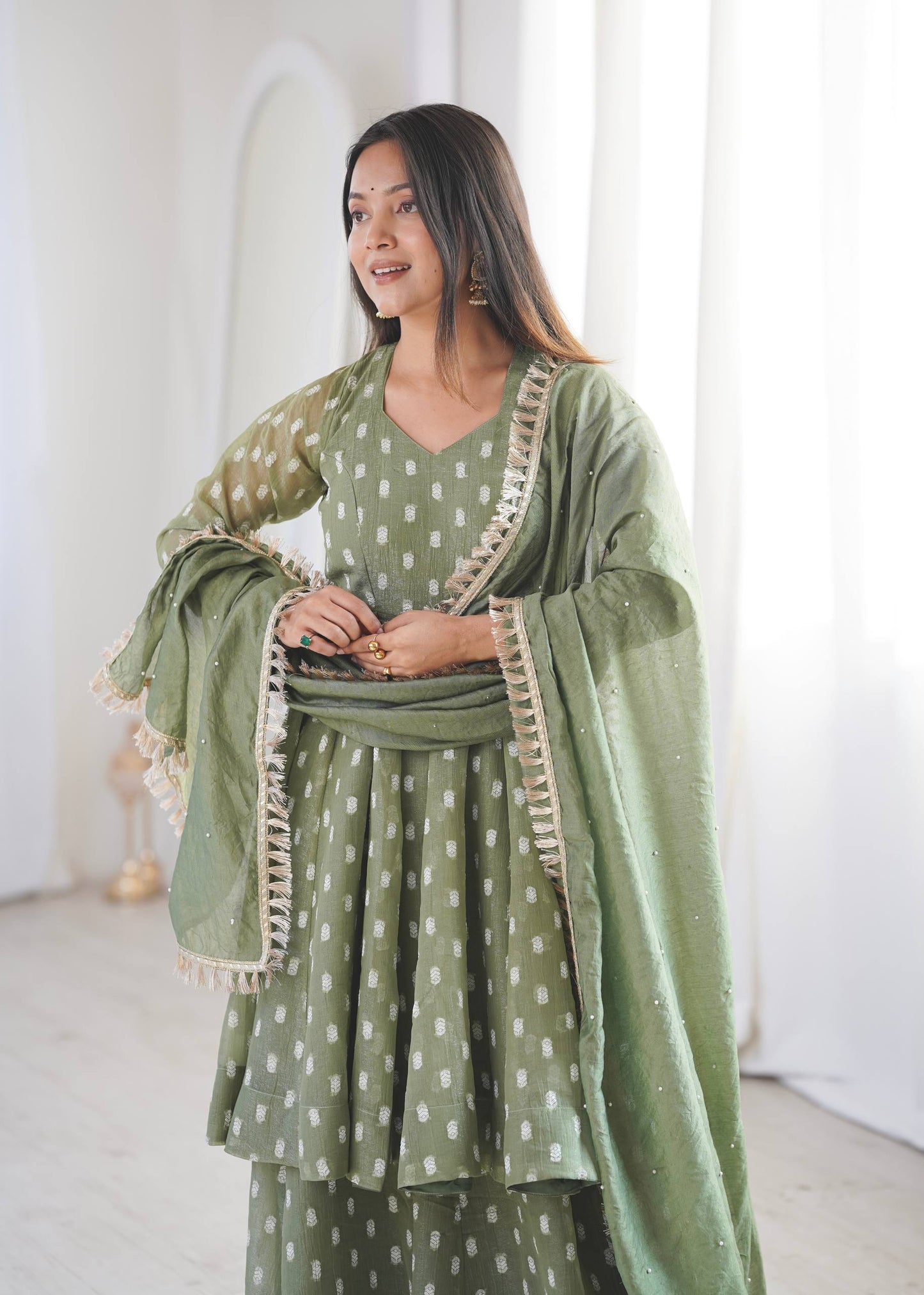 Eyes Catching Green Color Heavy Crunchy Silk Sharara Suit