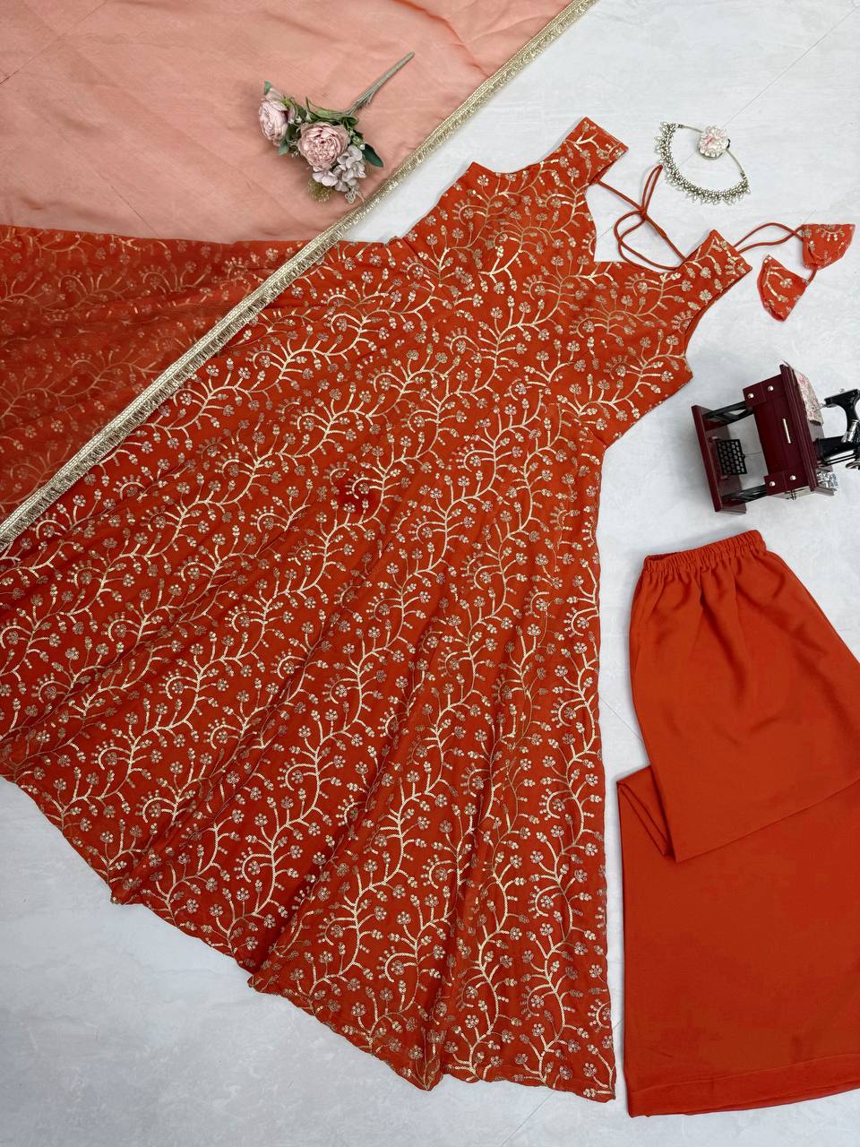 Eye Catching Orange Color Faux Georgette Palazzo Suit With Dupatta