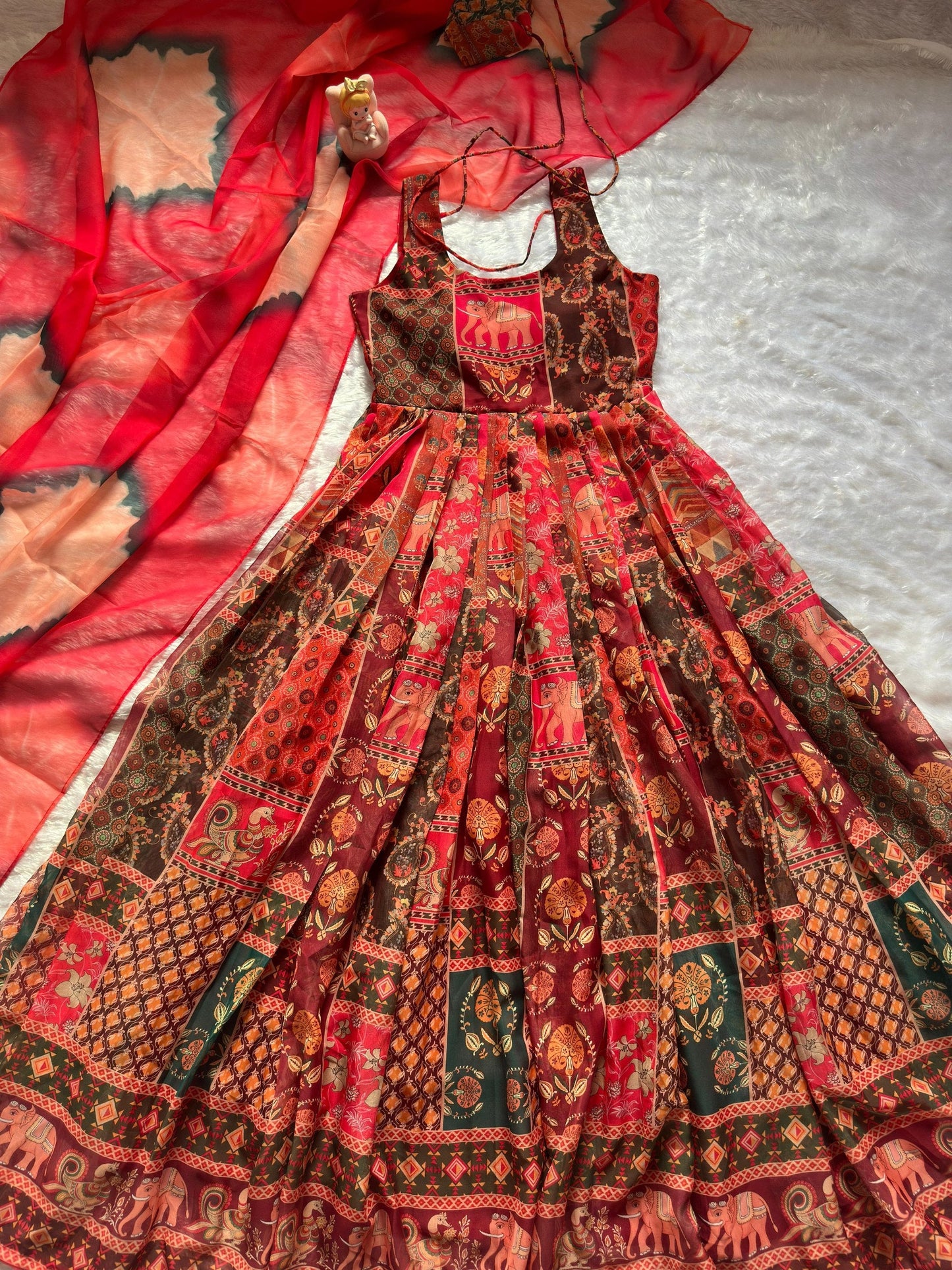 Attractive Maroon Color Soft Organza Patola Printed Gown