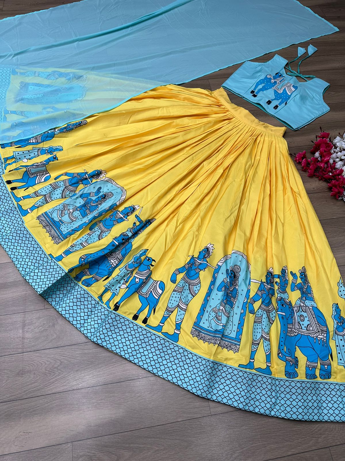 Exclusive Sky Blue Printed Blouse With Yellow Lehenga