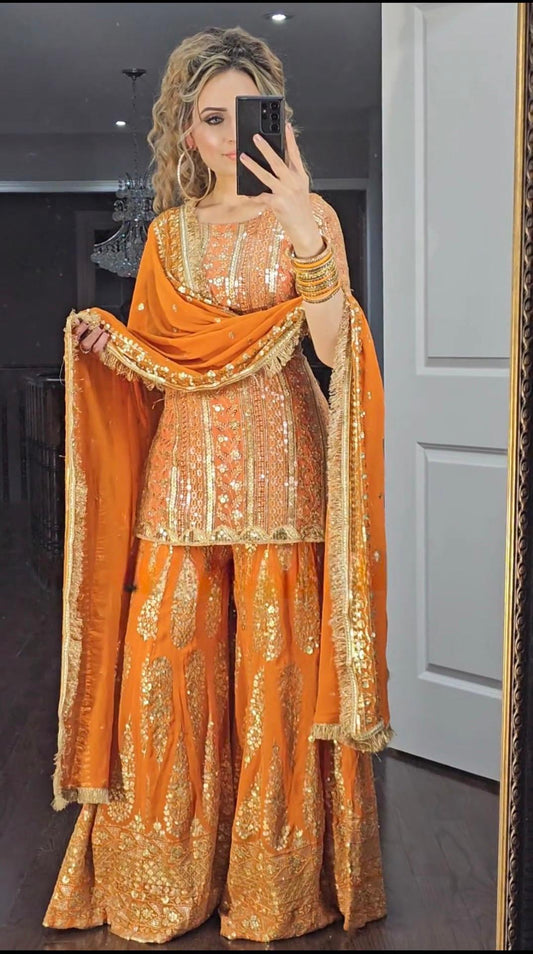 Eyes Catching Georgette Embroidery Work Orange Color Sharara Suit