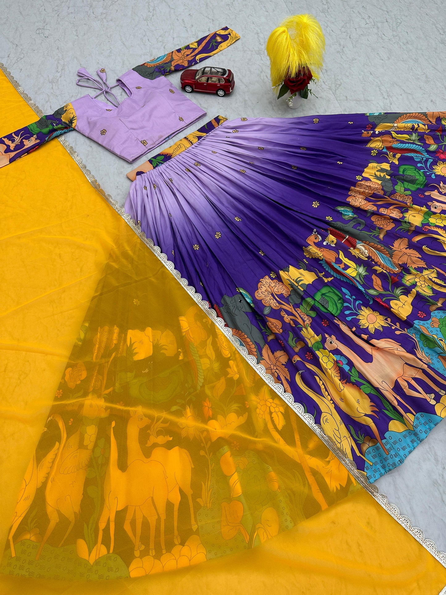 Glimmering Lavender And Blue Color Cotton With Kalamkari Printed Beautiful Lehenga Choli