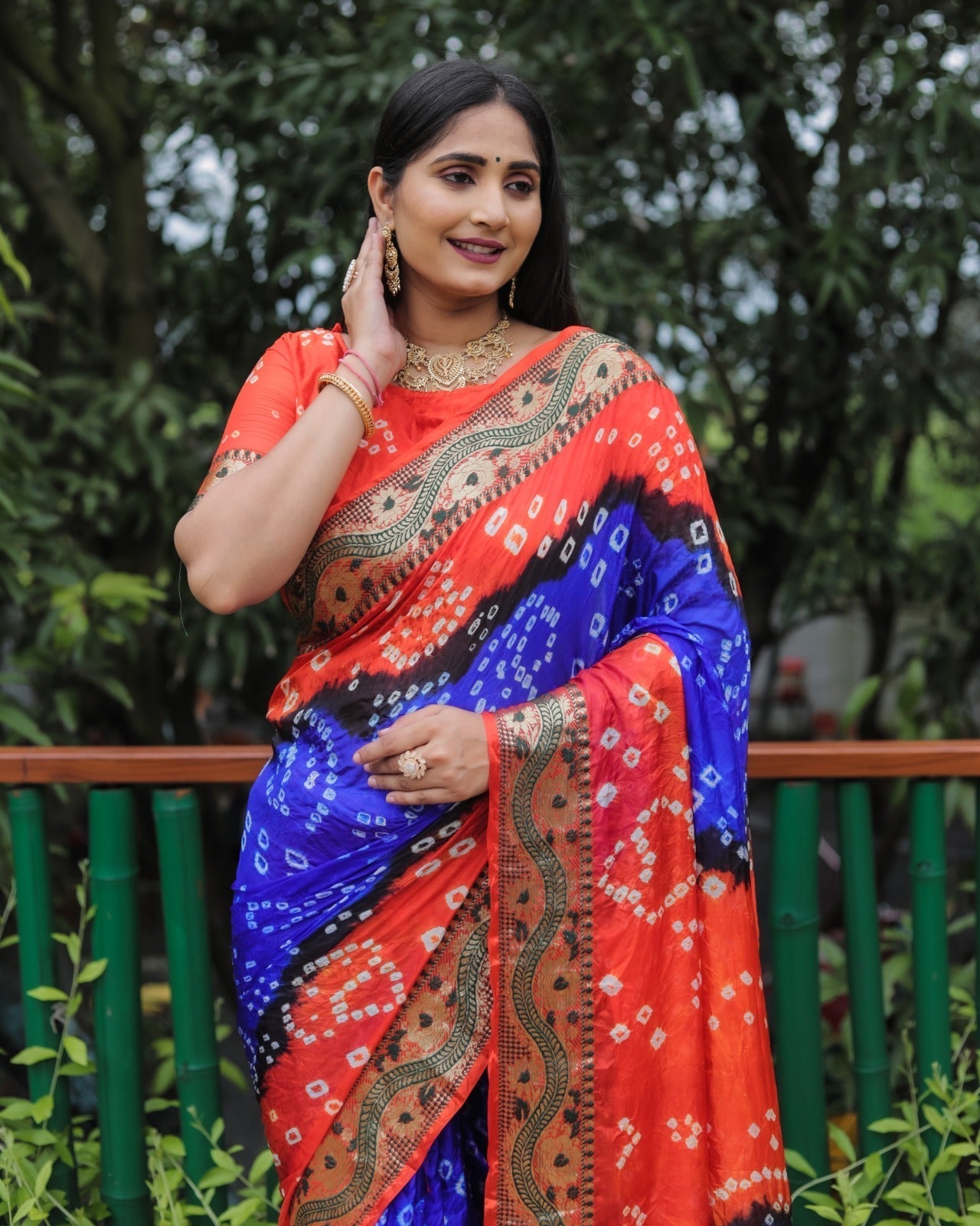 Bandhej With Zari Weaving Border Blue And Orange Saree