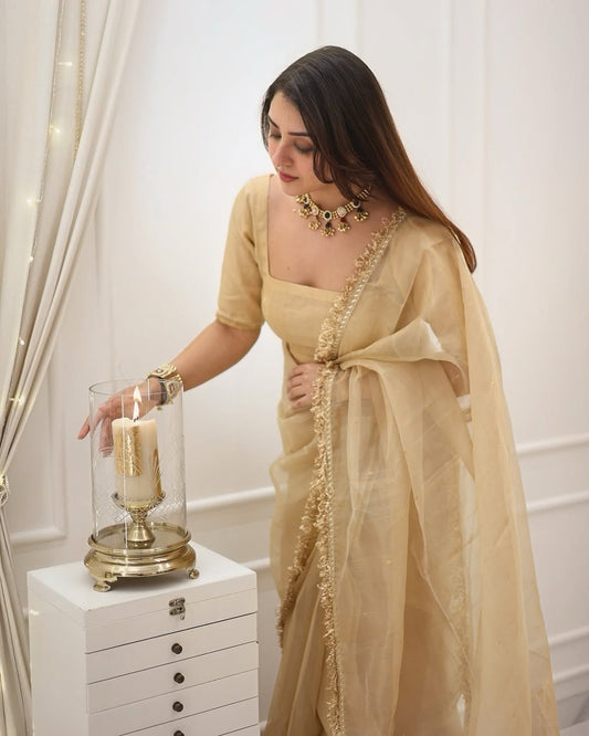 Pretty Goldy Crazy Cream Color Saree