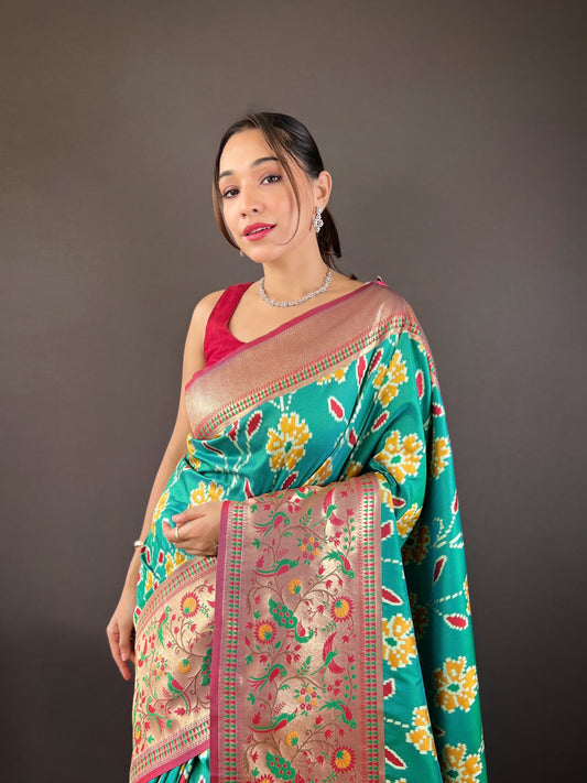 Adorable Silk Patola Weaving Teal Blue Color Saree