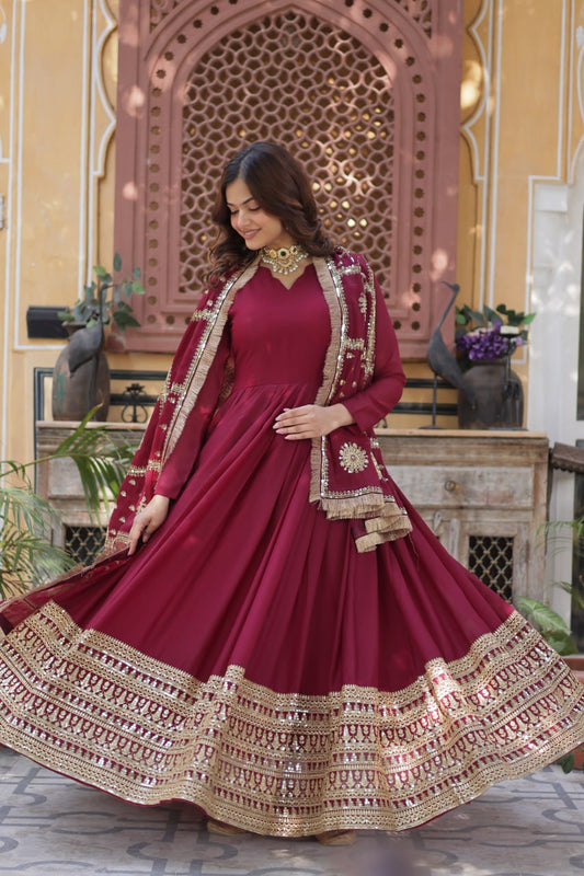 Presenting Embroidery Zari Sequins Work Maroon Color Gown With Dupatta