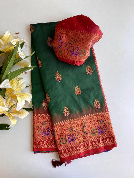 Ravishing Paithani Silk Green Color Zari Weaves Saree