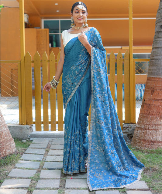 Captivating Silk Floral Design Teal Blue Color Saree