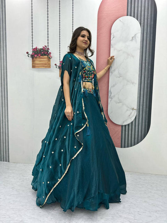 Fancy Embroidery Work Teal Green Color Lehenga Choli With Strug