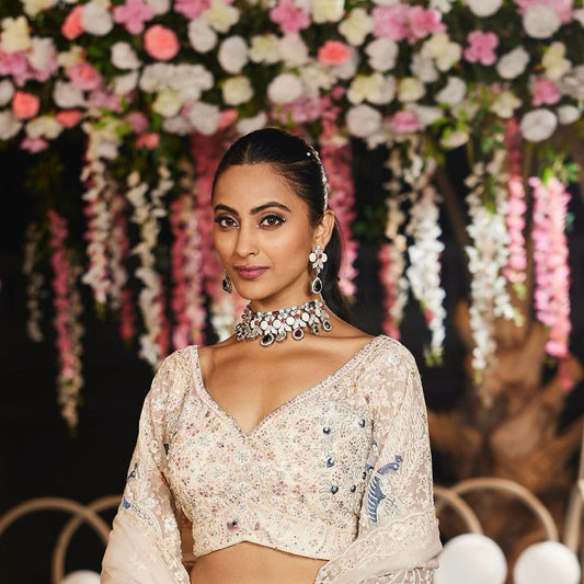 Bridal Wear Heavy Work Cream Color Lehenga Choli