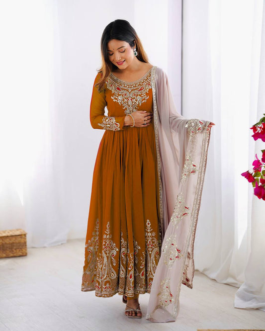 Imposing Orange Color Gown With White Dupatta