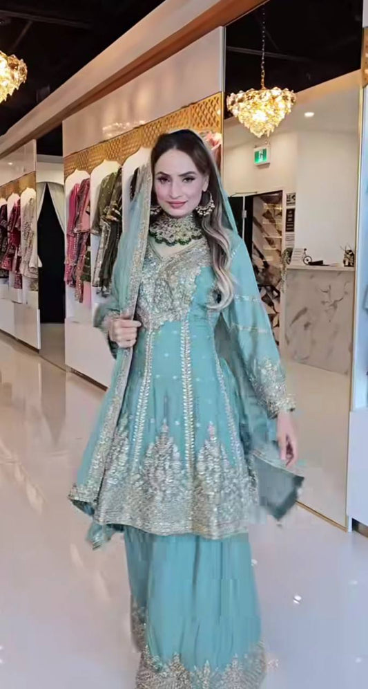 Flattering Sky Blue Color Heavy Work Sharara Suit