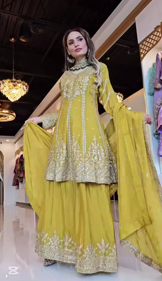 Flattering Yellow Color Heavy Work Sharara Suit
