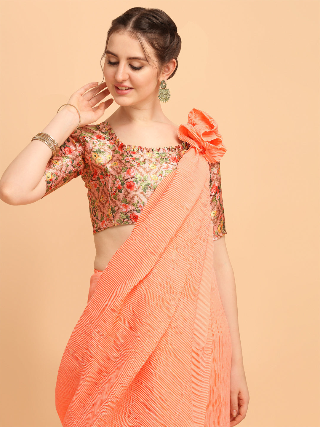 Good Looking Orange Color Pleated Saree