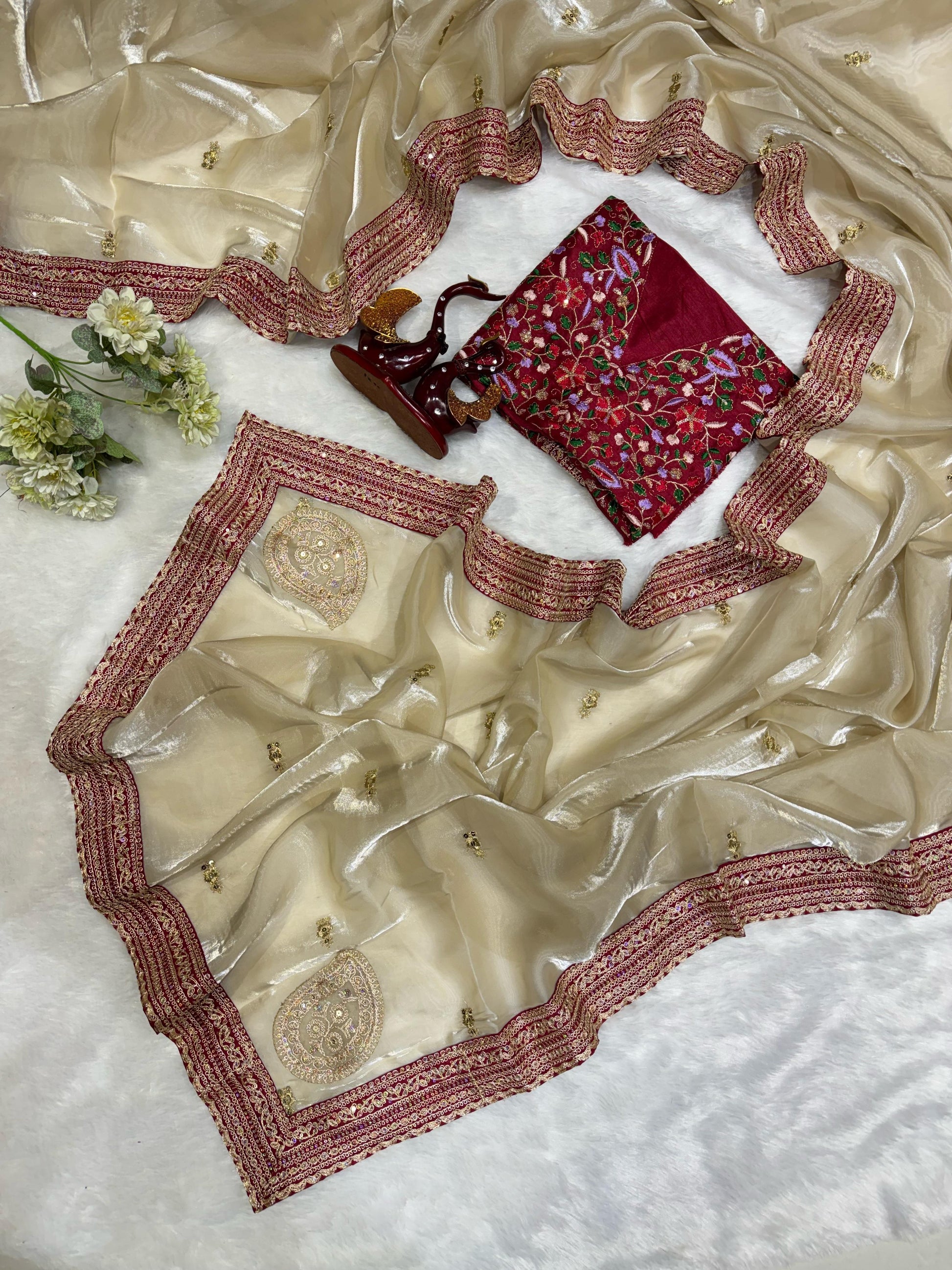 Imposing Jimmy Choo Beige Color Saree