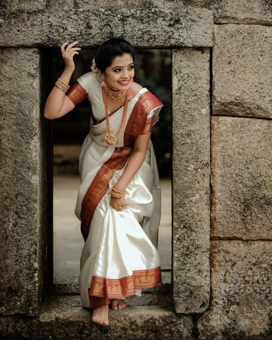 Opulent White Color Soft Lichi Silk Golden Zari Saree