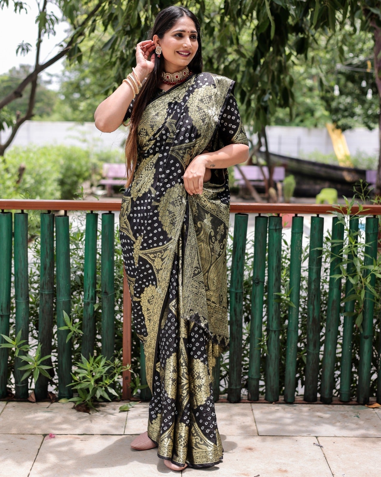 Trendy Zari Weaving Border Black Color Pure Bandhani Saree