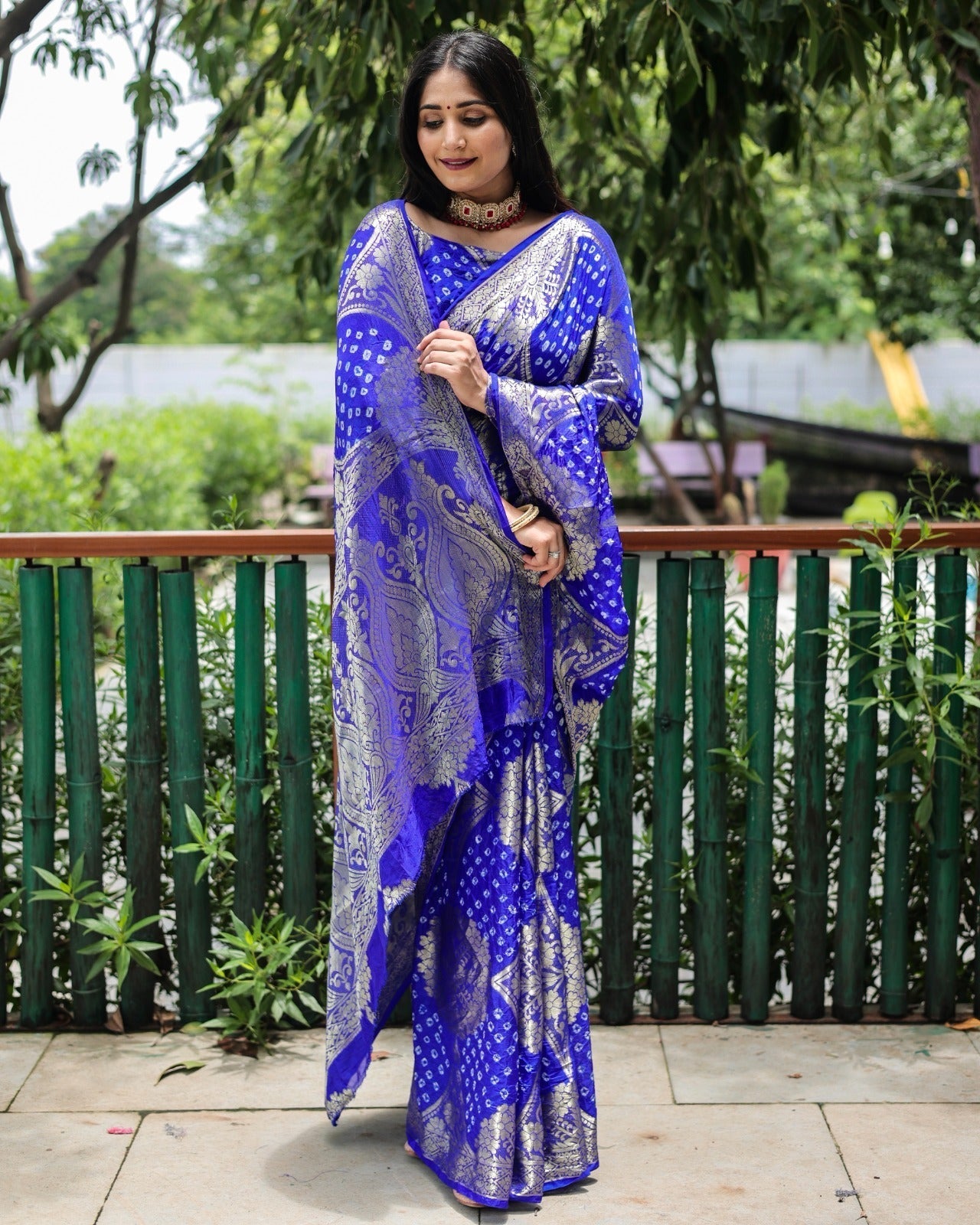 Trendy Zari Weaving Border Blue Color Pure Bandhani Saree