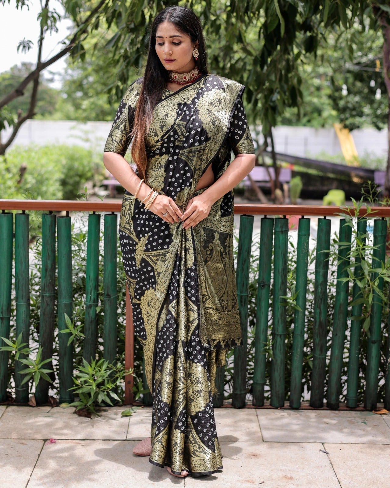 Trendy Zari Weaving Border Black Color Pure Bandhani Saree