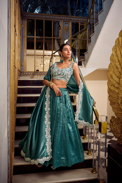 Luxuriant Teal Color Gold Crush Lehenga With Sequins And Thread Embroidery With Jarkan Diamond Work Blouse