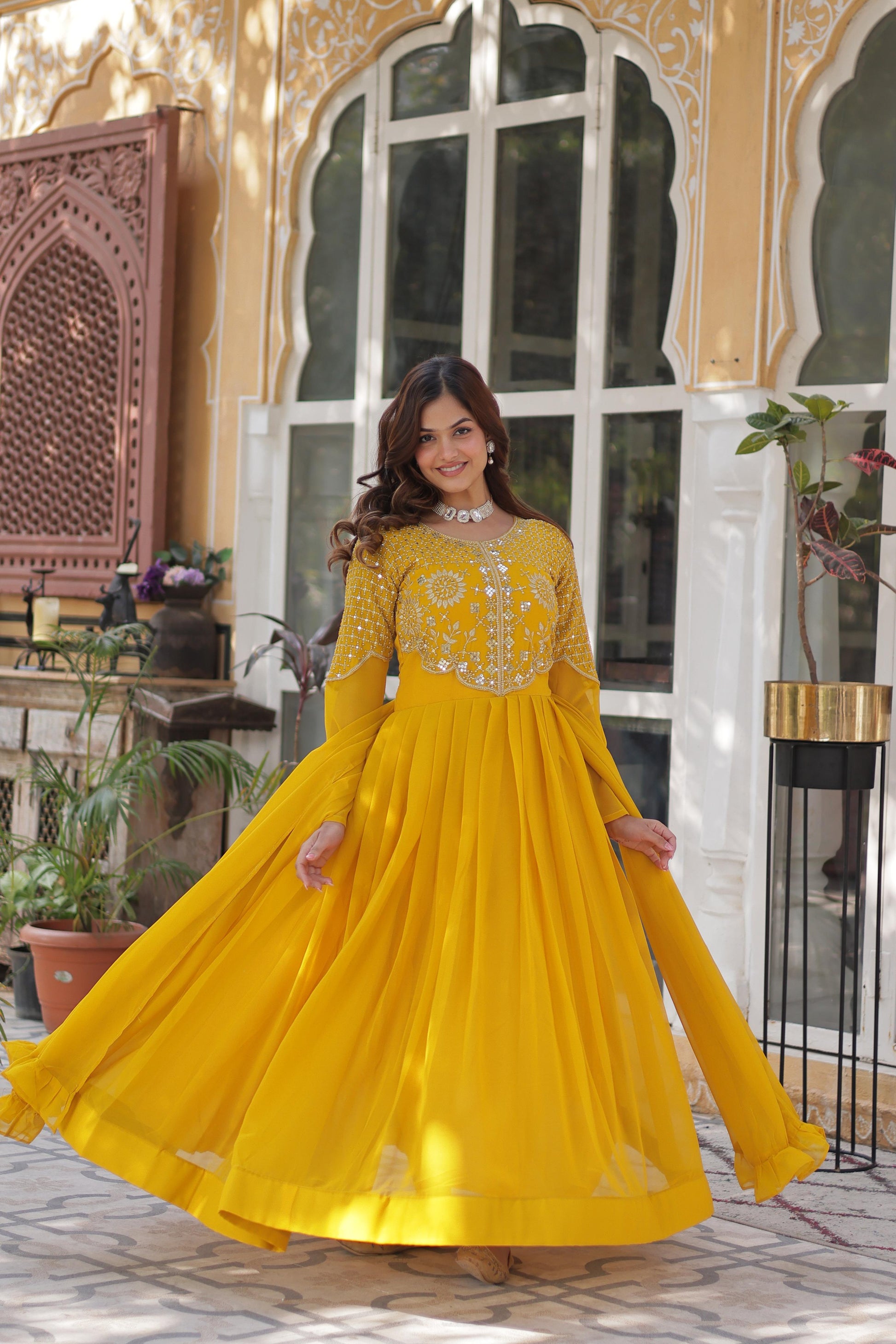 Stunning Georgette Embroidered Work Yellow Color Gown