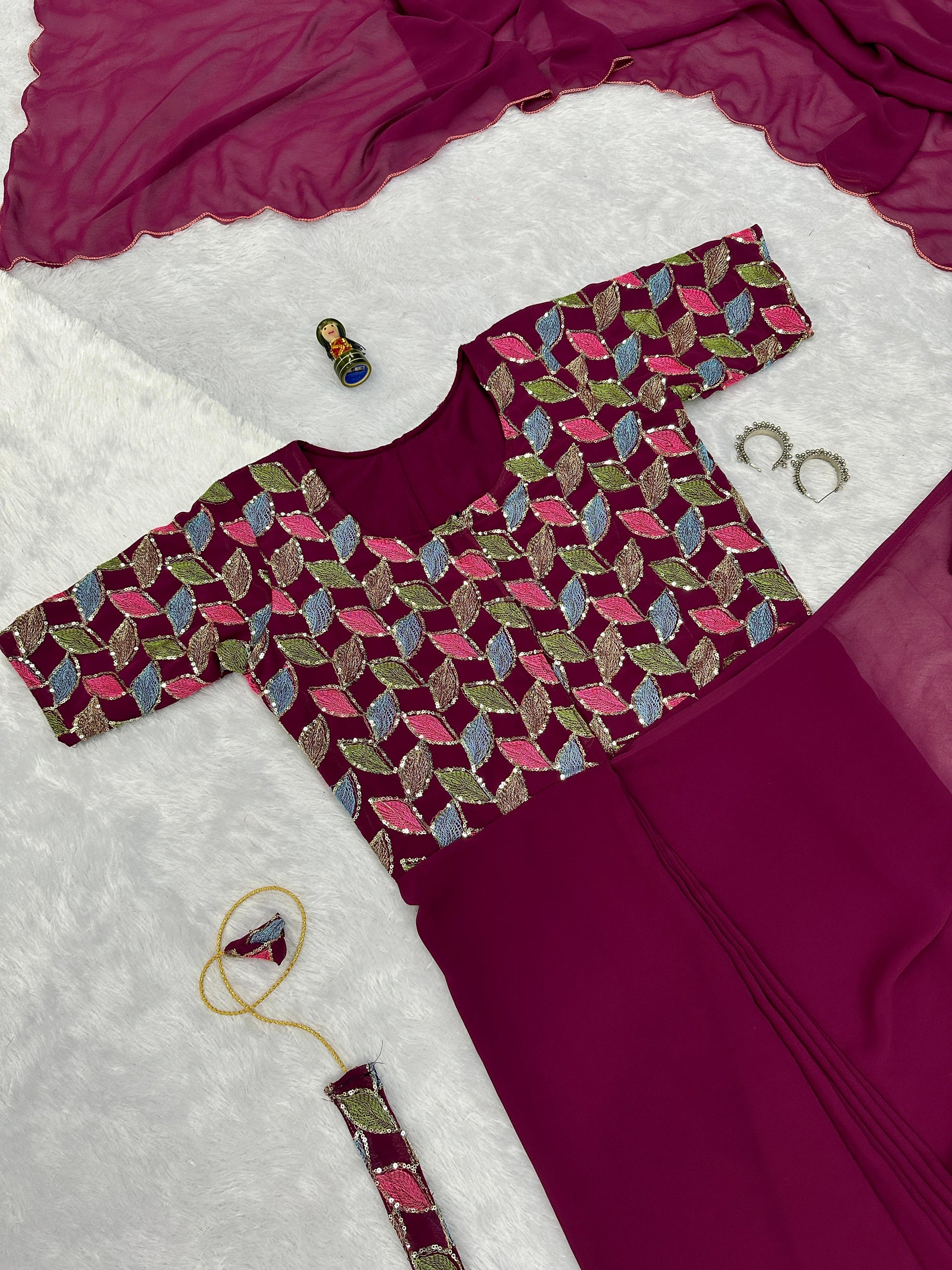 Charming Georgette Maroon Color Gown