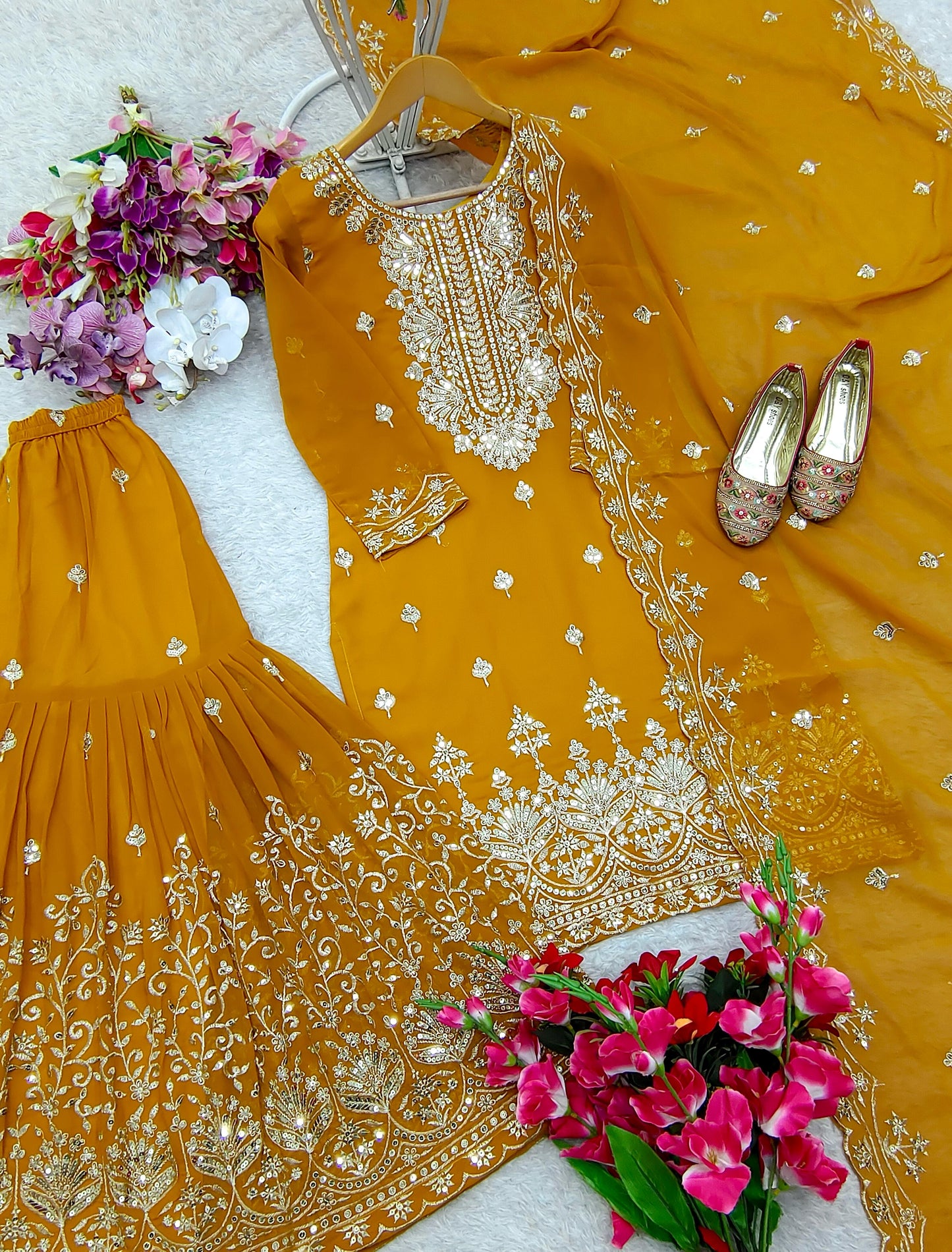 Charming Georgette Mustard Color Sharara Suit