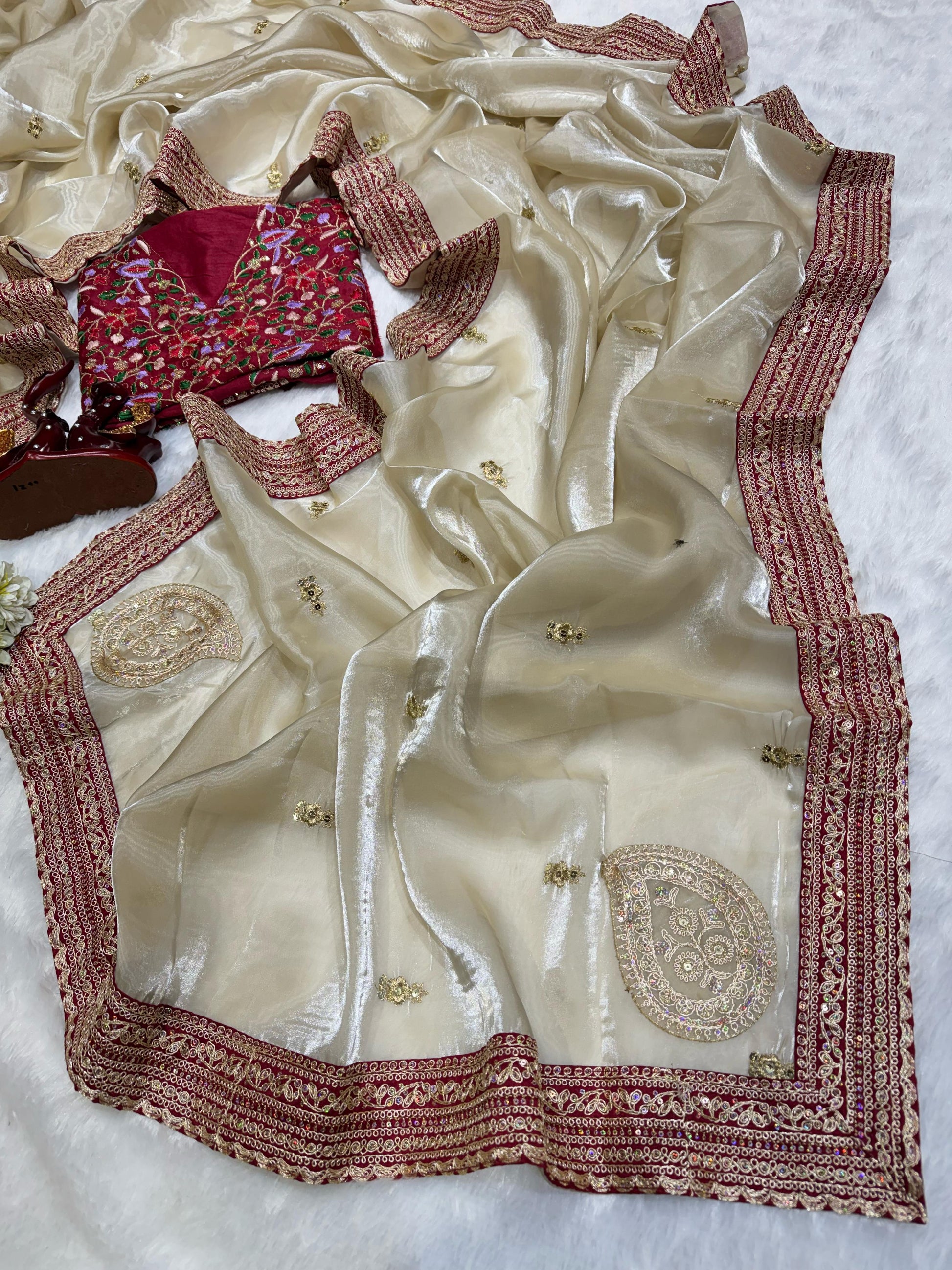 Imposing Jimmy Choo Beige Color Saree