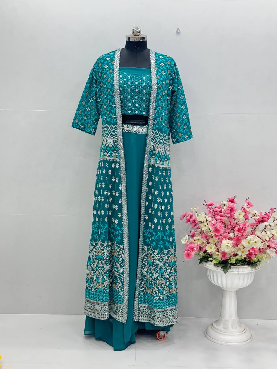 Celebrity Style Aqua Green Color Faux Georgette With Embroidered Sequence Work Lehenga Choli With Koti