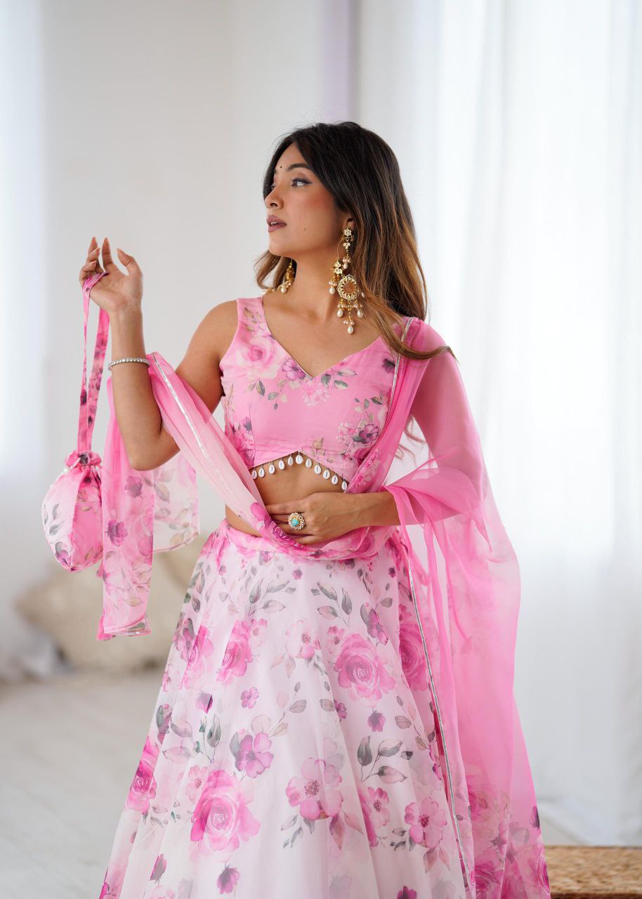 Pink Color Organza Silk Arti Chauhan Wear Fully Stiched Lehenga Choli With Potali Bag