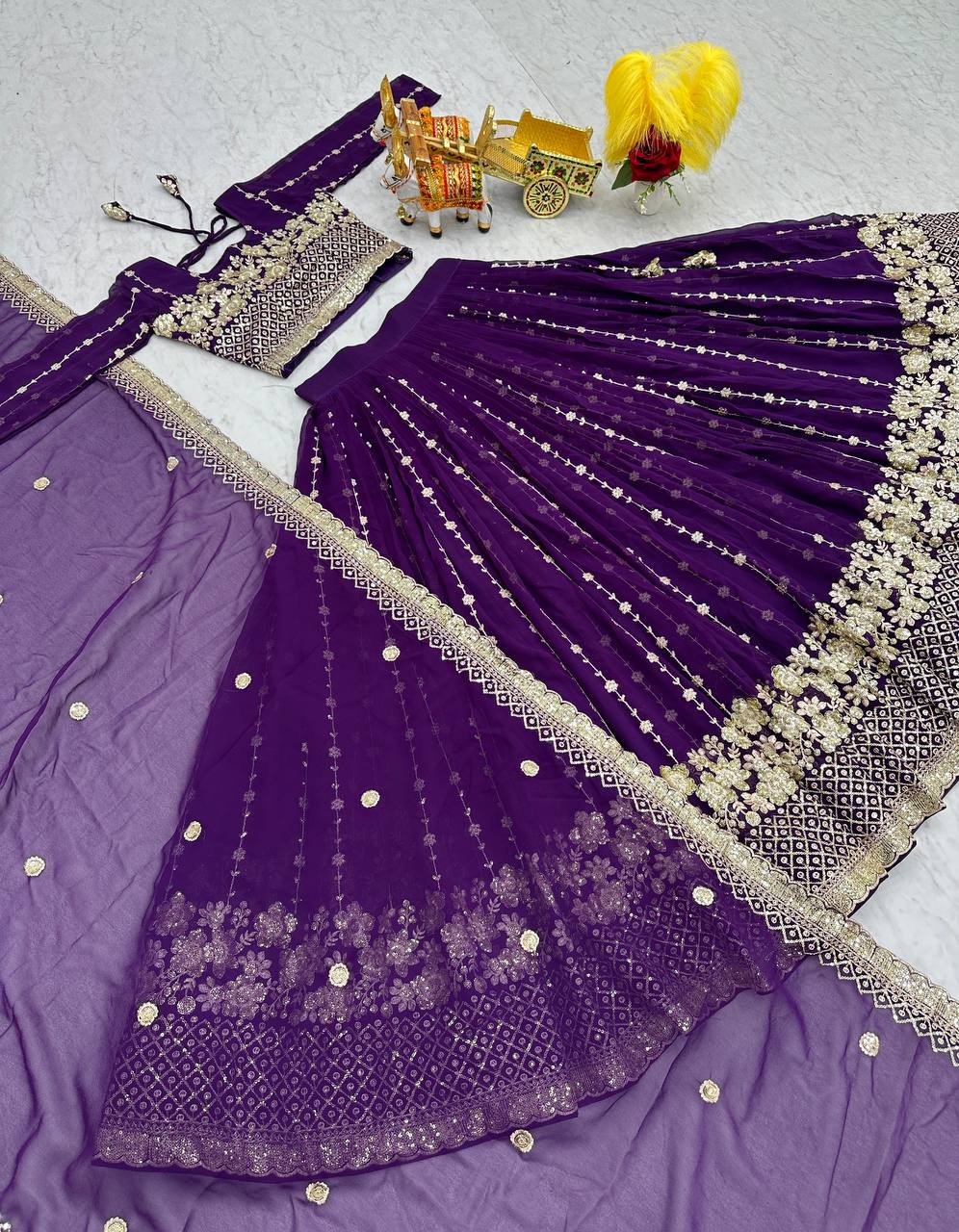 Mesmerizing Purple Color Heavy Faux Georgette And Embroidery Sequence Work Lehenga Choli