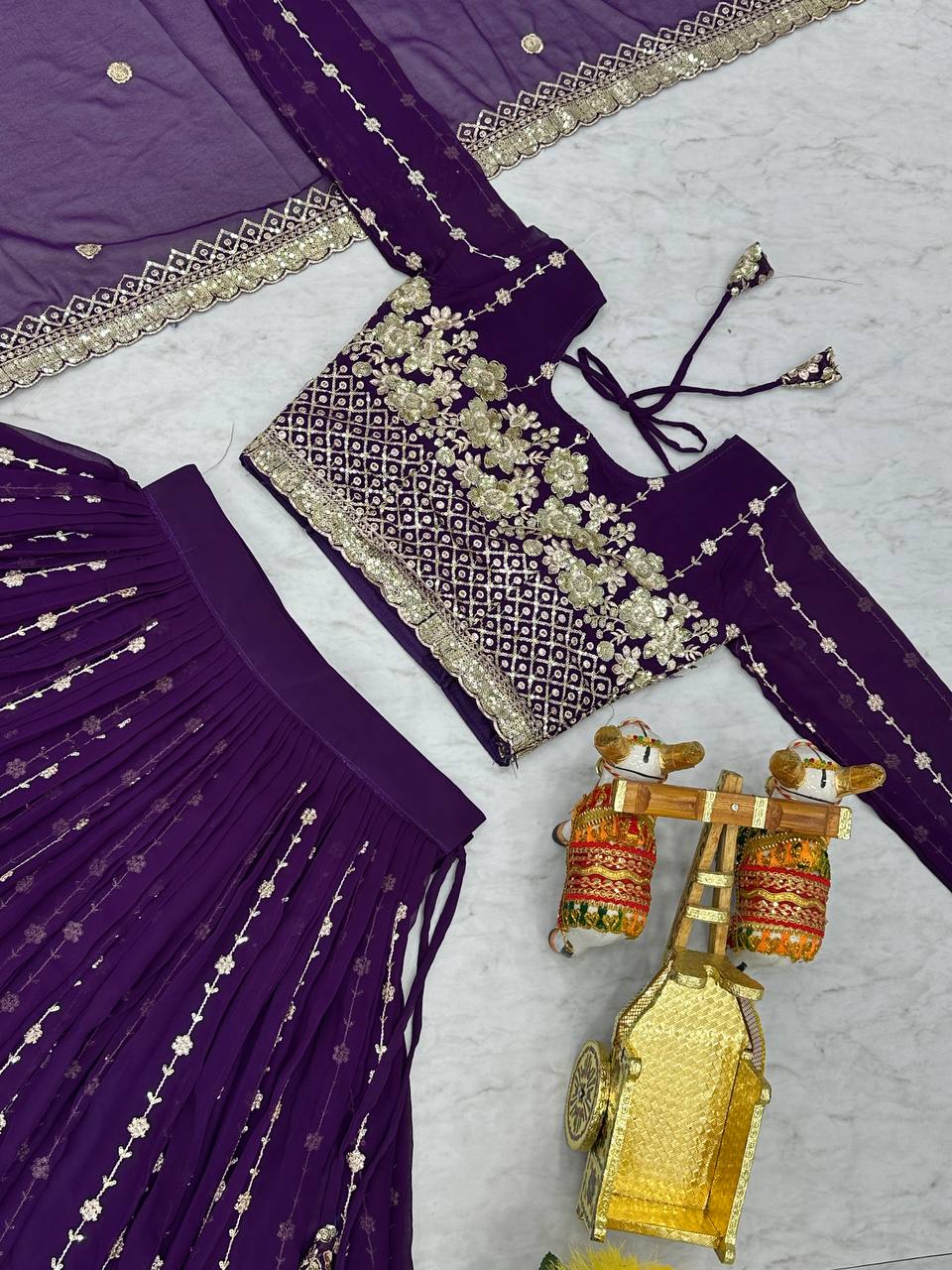 Mesmerizing Purple Color Heavy Faux Georgette And Embroidery Sequence Work Lehenga Choli
