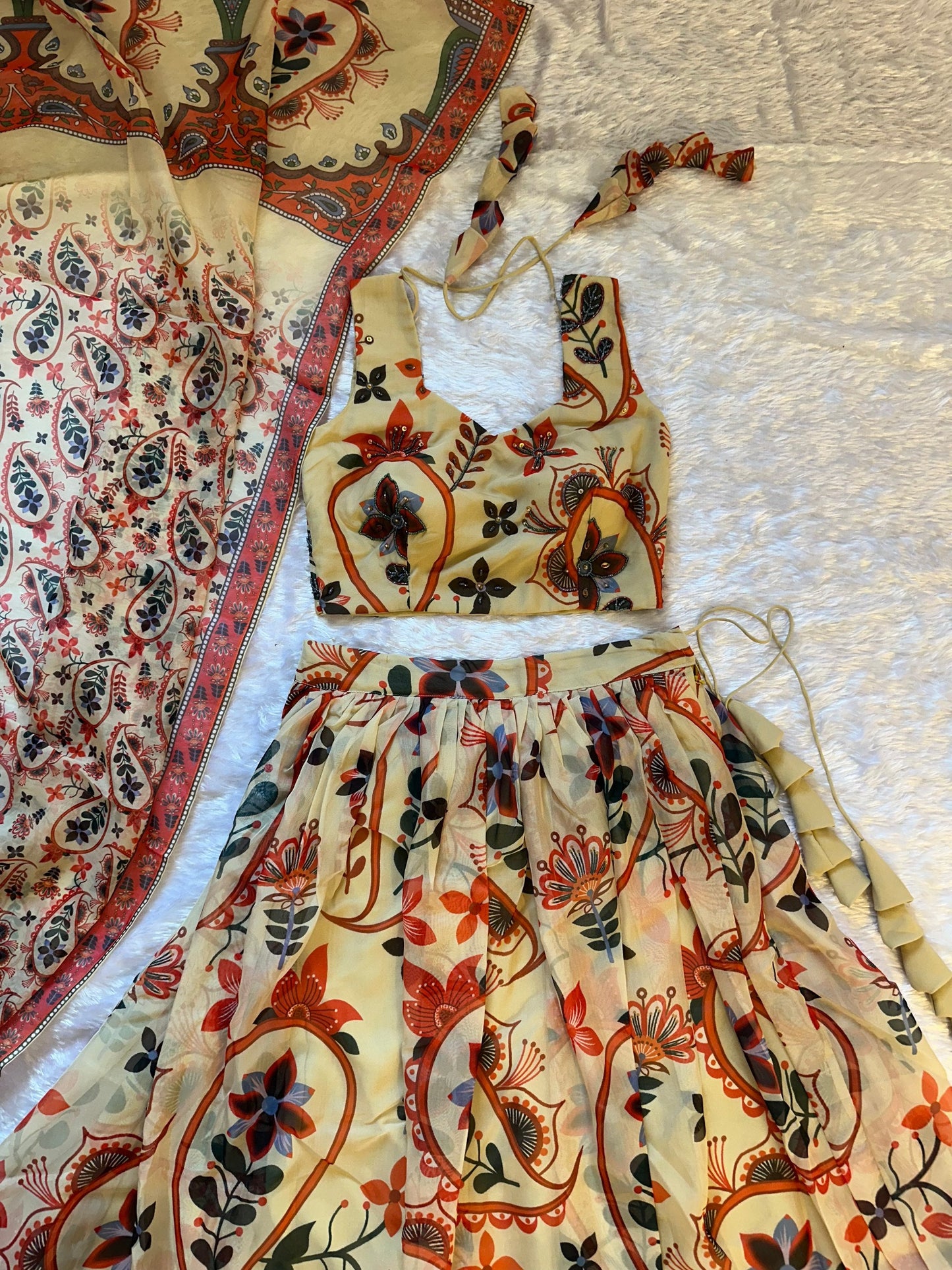 Outstanding Beige Color Floral Printed Lehenga Choli