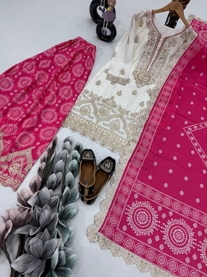 Ravishing Pink Color Heavy Embroidered Sequence Coding Work With Real Mirror Hand Work Sharara Suit