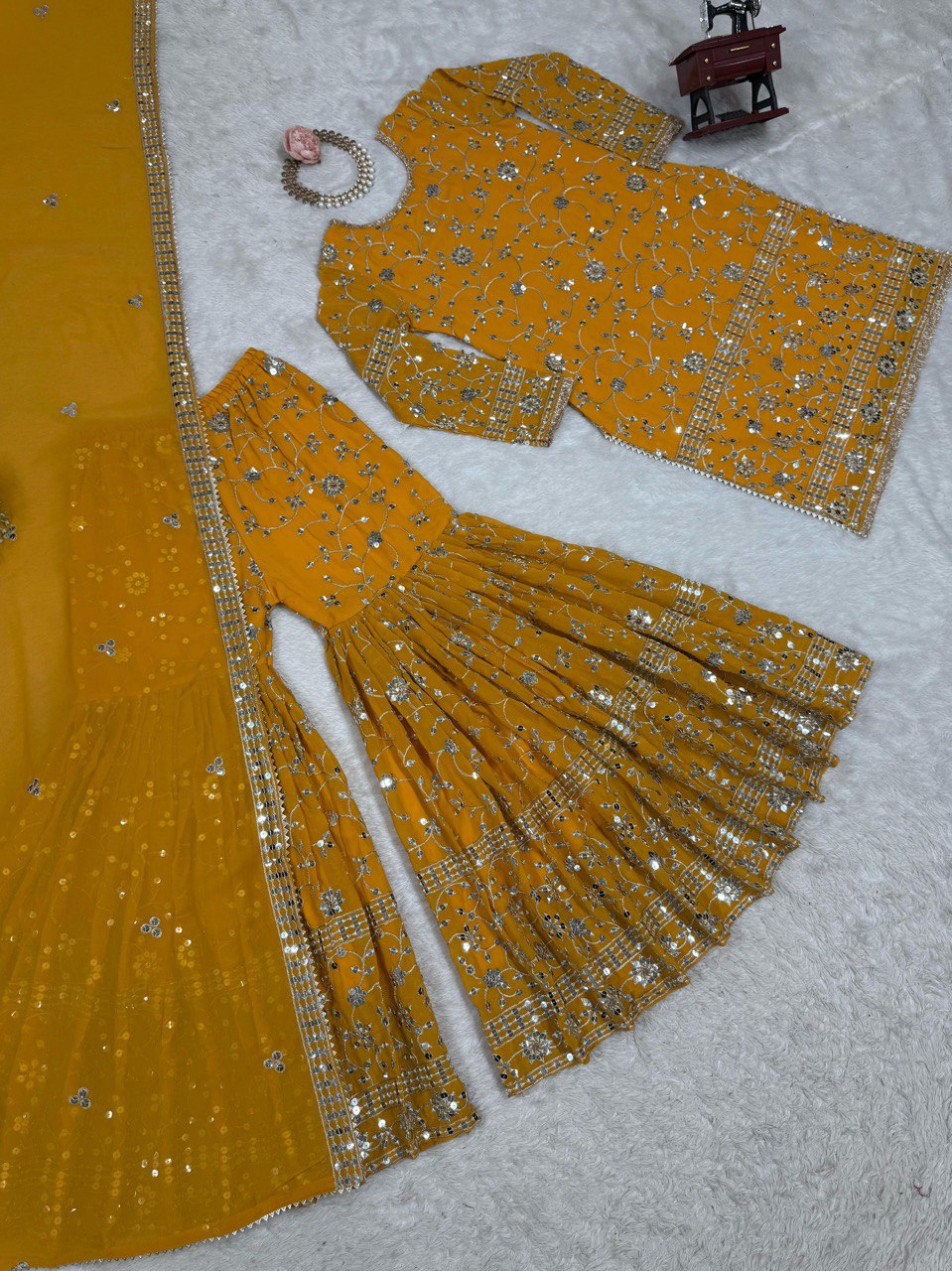 Captivating Mustard Color Faux Georgette And Thread With 9mm Sequence Work Sharara Suit
