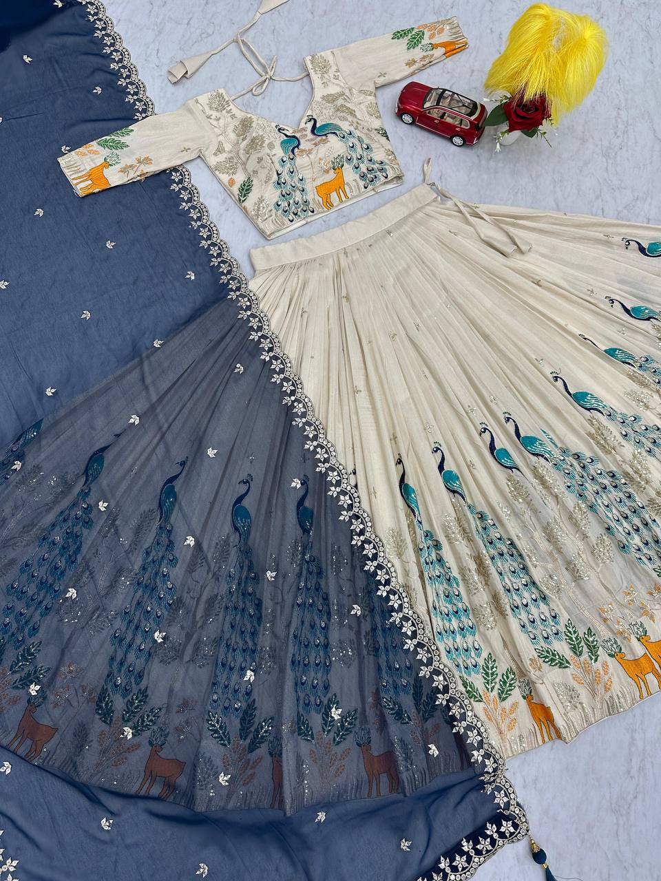 Party Wear Pure Tissue Silk With Heavy Thread And Sequence Work Designer Lehenga Choli