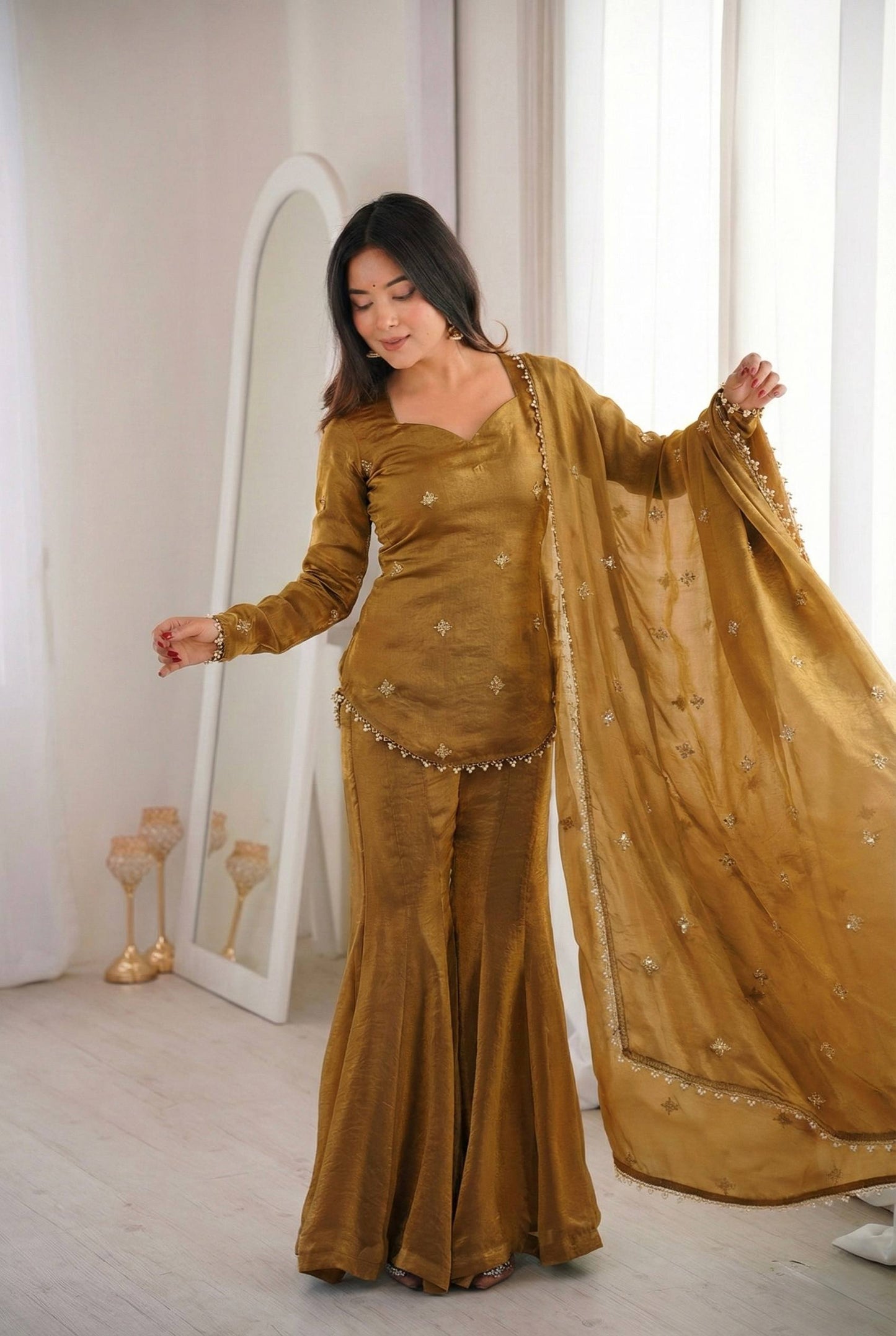 Arti Chauhan Wear Gold Color Fendy Silk Short Top Sharara Set