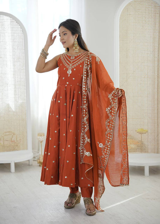 Wedding Wear Orange Color Roman Silk Arti Chauhan Anarkali Gown Set