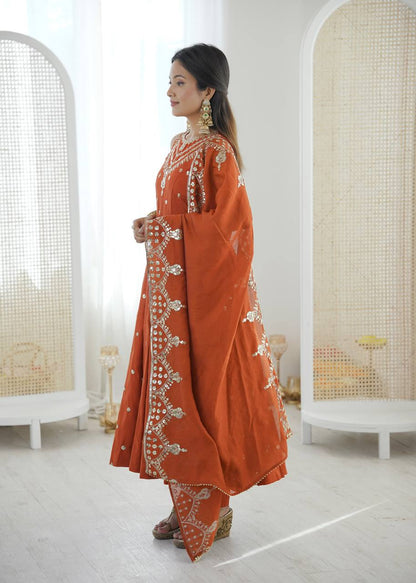 Wedding Wear Orange Color Roman Silk Arti Chauhan Anarkali Gown Set