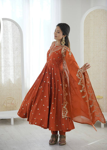 Wedding Wear Orange Color Roman Silk Arti Chauhan Anarkali Gown Set