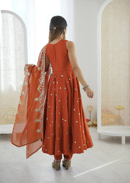 Wedding Wear Orange Color Roman Silk Arti Chauhan Anarkali Gown Set