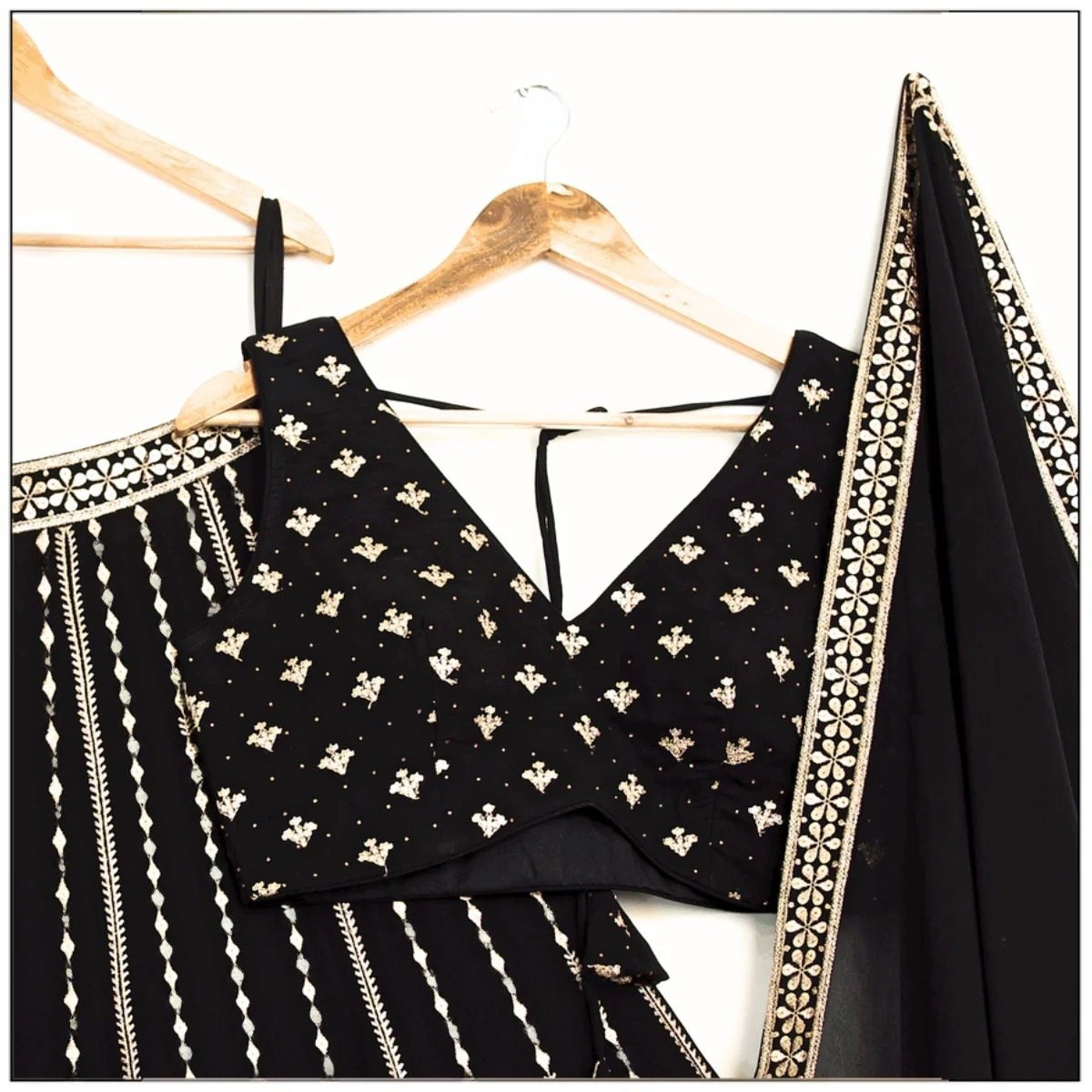 Glossy Black Color Embroidered Zari Work Lehenga Choli