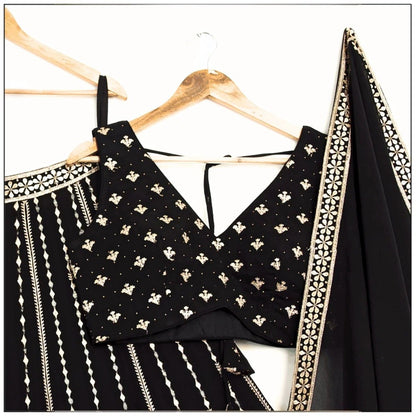 Glossy Black Color Embroidered Zari Work Lehenga Choli
